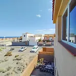 Magical House In Front Of A Sunrise Beach